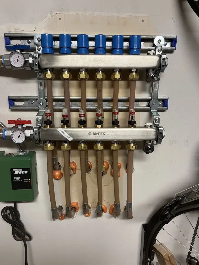 Plumber performing Water Heater Repair at a residential property in Bennett